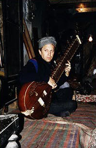 In the music shop of Kanailal and Brother, I practice informally on the surbahar. In the music shop of Kanailal and Brother, I practice informally on the surbahar.